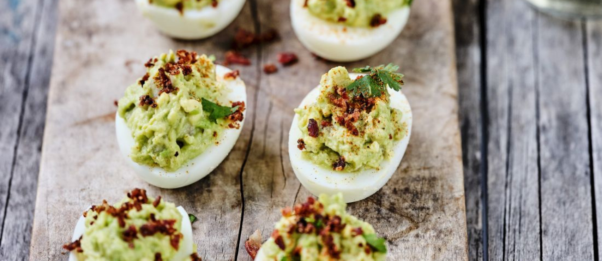 Mimosa Eggs with Guacamole & Bacon Crumbs